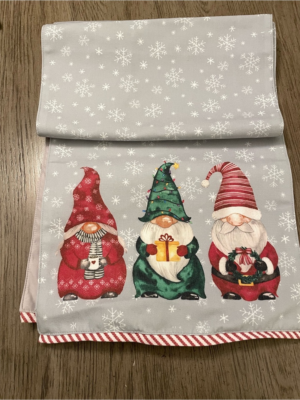 FAO Schwarz light up 70” table runner, Christmas themed, gnomes & snowflakes.